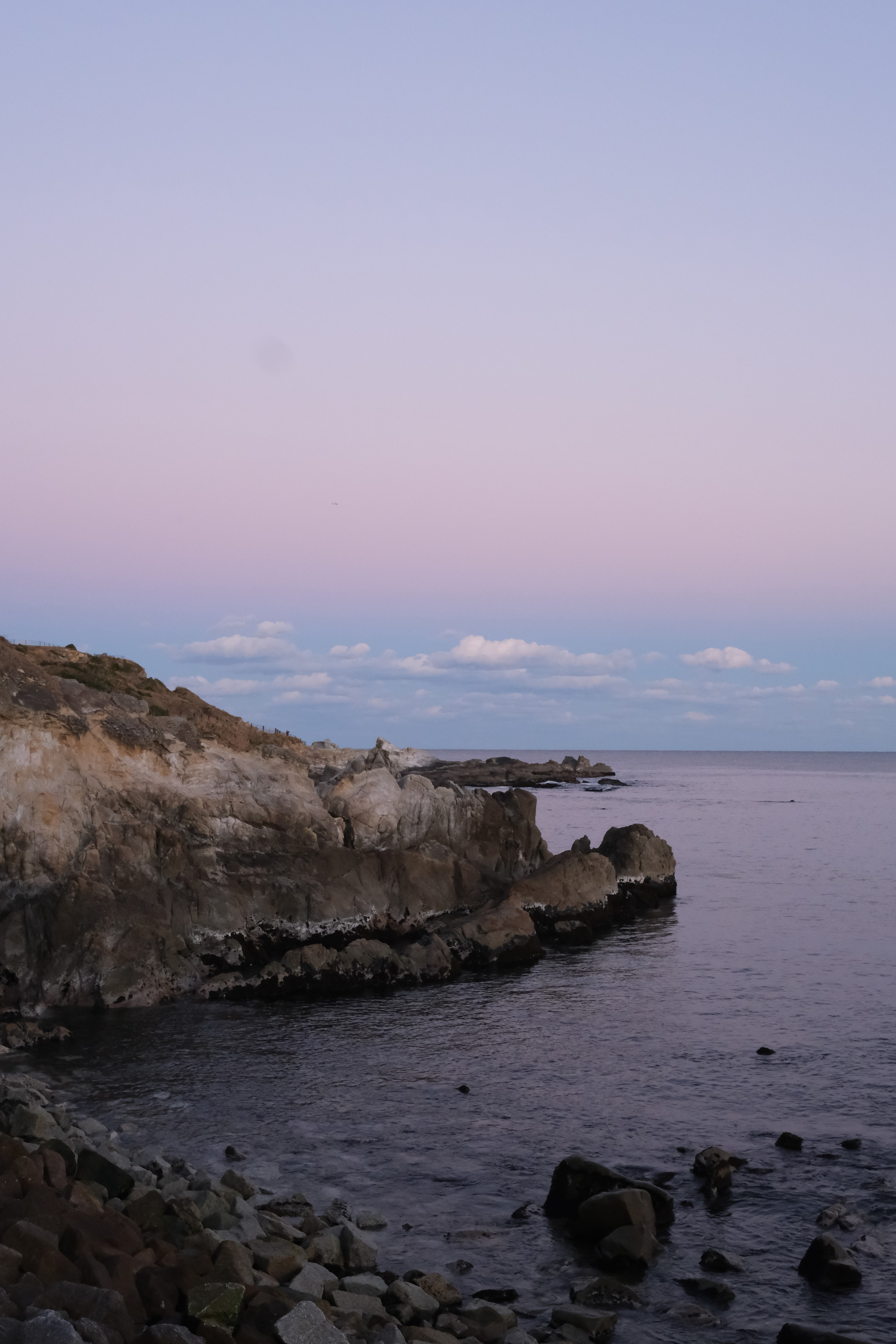 A rocky coastline during magic hour